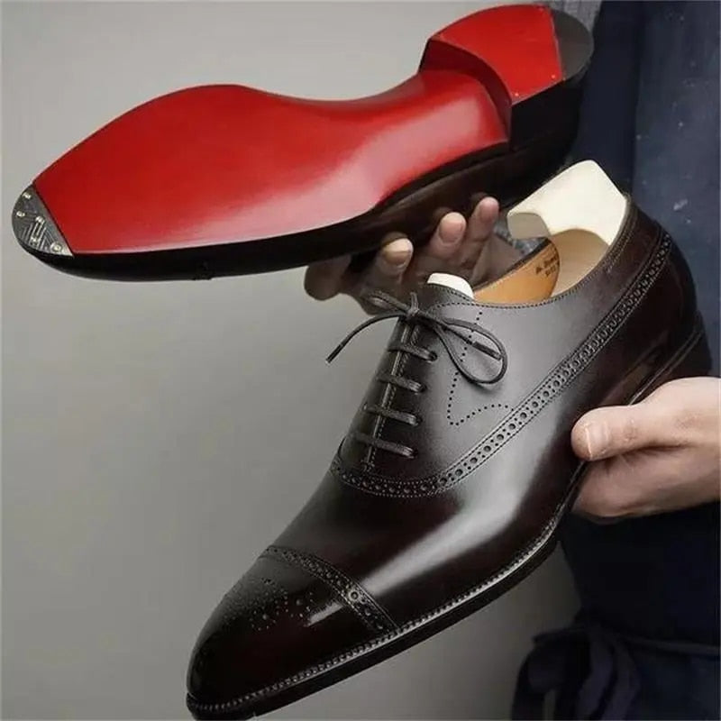 Elegant men's polished brown brogue oxford dress shoes, ideal for sophisticated business & formal events.