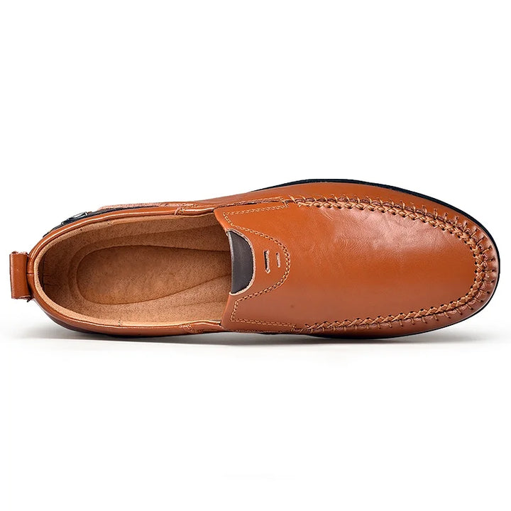 High-quality men's premium leather loafers, offering ultimate comfort & timeless style for daily wear. Slip-on shoes.