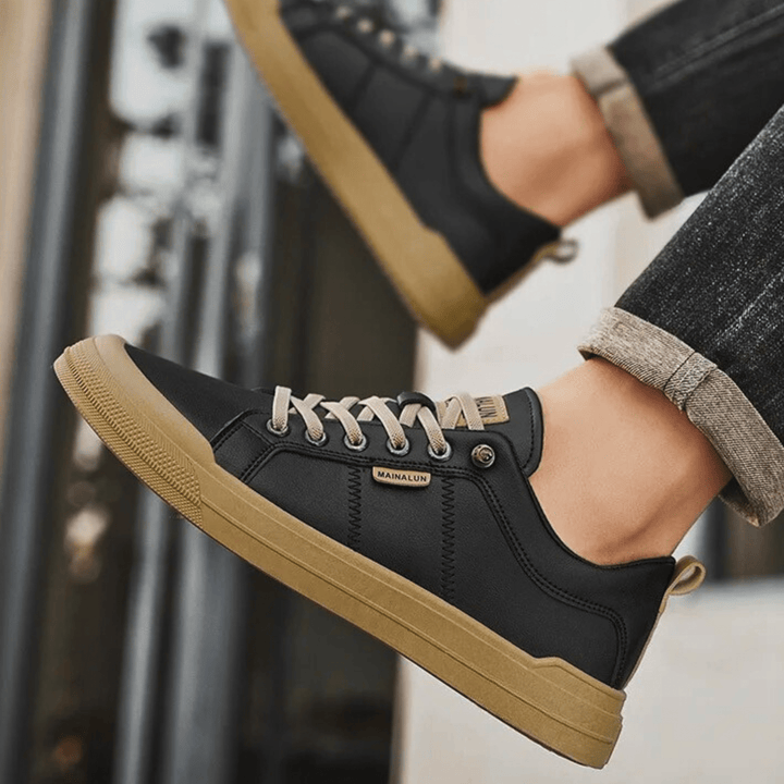 Modern men's everyday sneakers. Premium low-top design, offering comfortable, versatile casual footwear for walking.