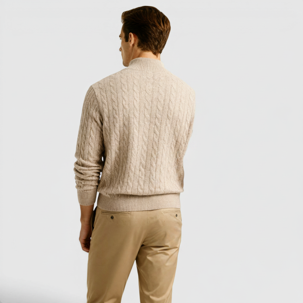 Man in a meeting wearing a versatile half-zip sweater, suitable for modern business casual.