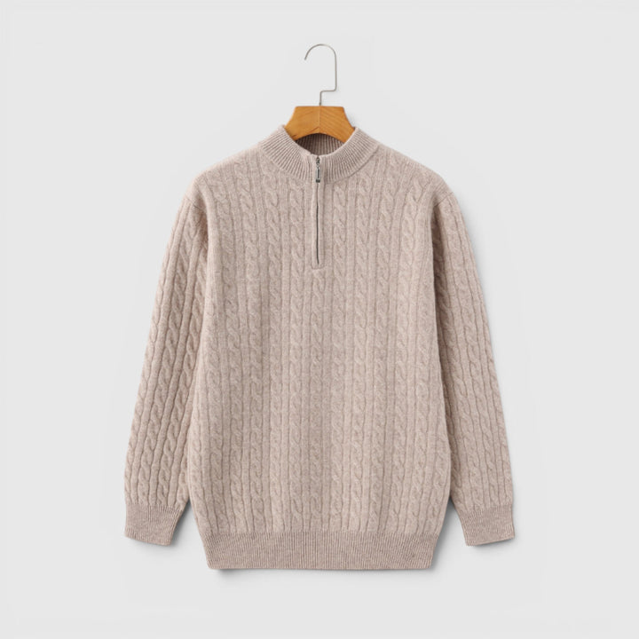 Neatly folded men's premium half-zip knit sweater, showing its rich texture & quality.