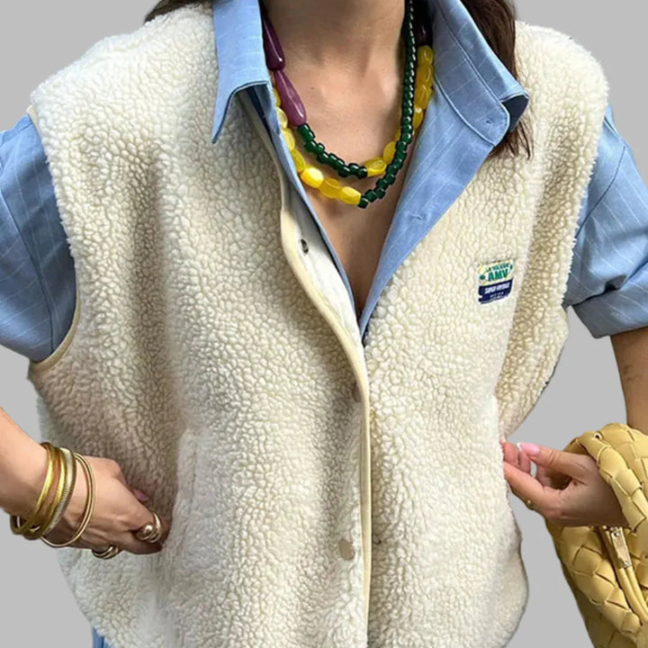 Stylish and comfortable men's lightweight button-up vest, ideal for year-round layering.