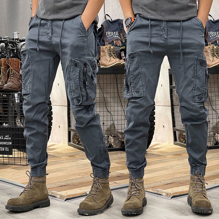 Stylish men's cargo trousers with multiple functional pockets. Perfect for utility, outdoor activities, or casual comfort.