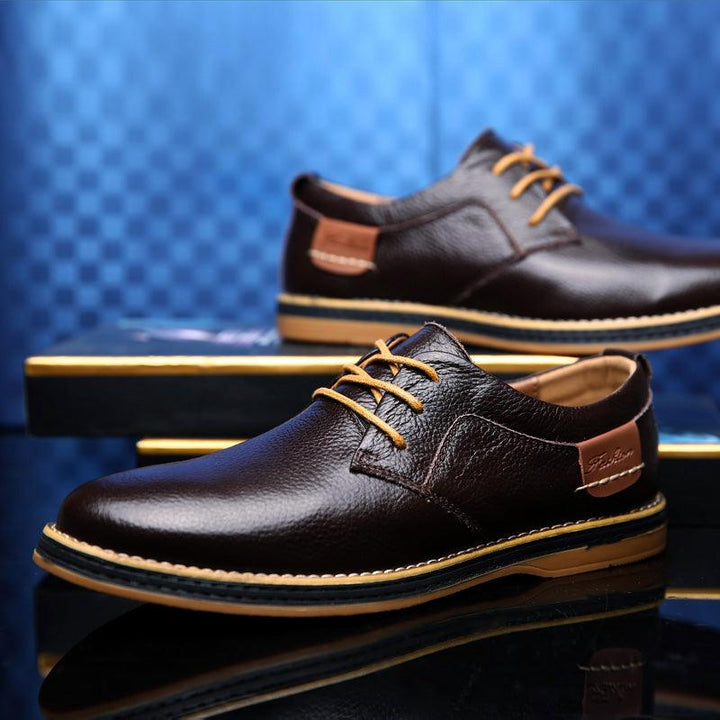 Men's classic Oxford dress shoes. Professional lace-up footwear, perfect for formal events, business & timeless fashion.
