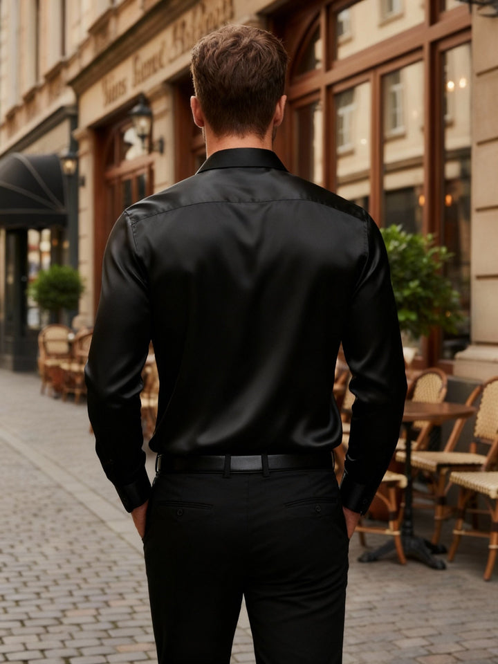 Man wearing a sophisticated men's silk business casual shirt, stylish and comfortable.