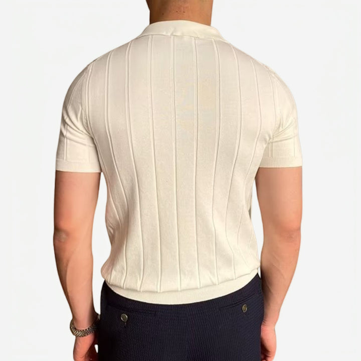 Stylish men's navy slim-fit polo shirt, a classic and versatile top for smart casual fashion.