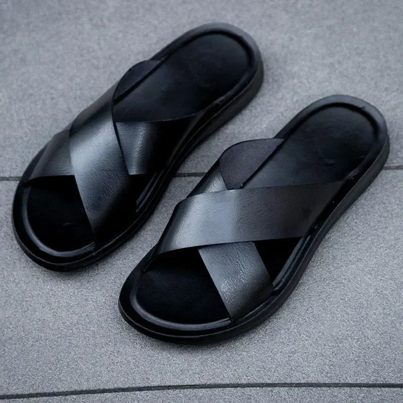 A pair of men's comfortable slip-on sandals, ideal for summer casual and outdoor wear.