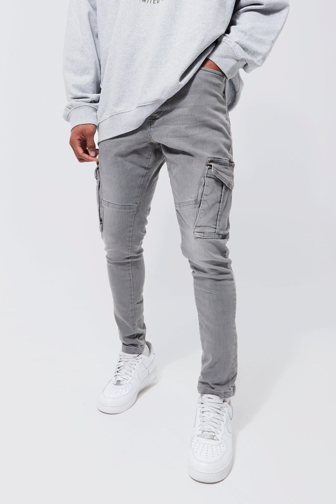Men's premium stretch skinny jeans in dark wash, slim fit for everyday comfort & modern style.
