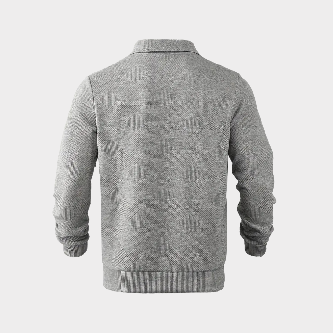 Modern men's textured long sleeve quarter zip top, ideal for casual layering & comfort.