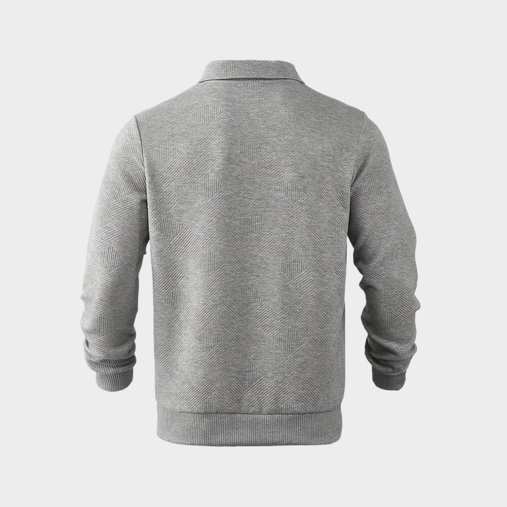 Modern men's textured long sleeve quarter zip top, ideal for casual layering & comfort.
