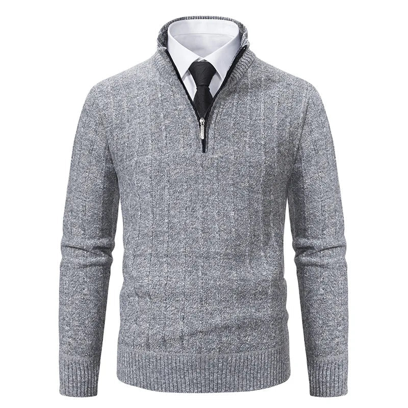 Stylish men's cable knit quarter zip pullover in a rich navy, perfect for layering during fall and winter.