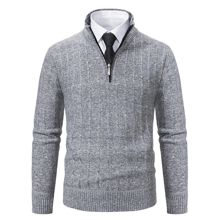 Stylish men's cable knit quarter zip pullover in a rich navy, perfect for layering during fall and winter.
