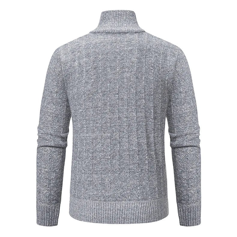 Soft textured cable knit men's quarter zip sweater in a deep green, providing cozy warmth and modern style.
