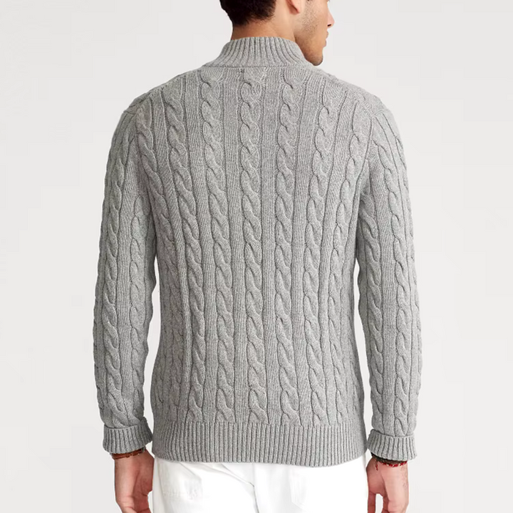 Cozy men's cable knit quarter-zip pullover sweater, perfect for winter fashion.