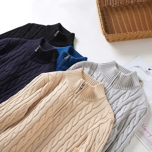 Classic men's quarter-zip cable knit pullover, essential timeless winter fashion.