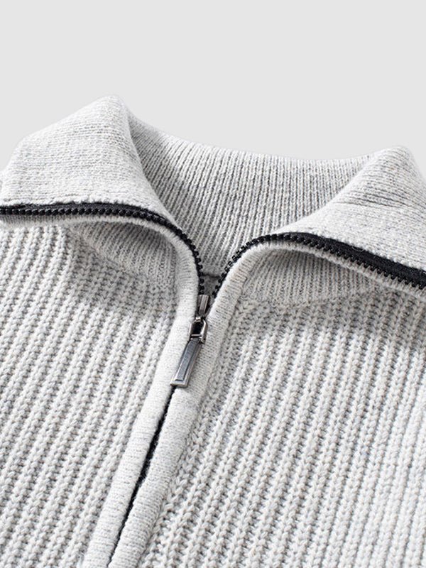 Stylish men's quarter zip sweater, ribbed knit texture, perfect for winter layering.