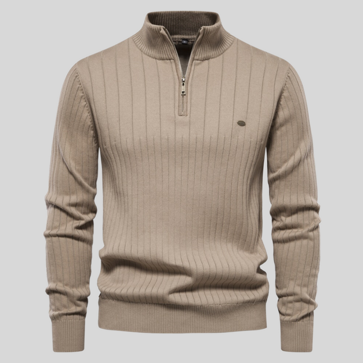 Fall/winter men's quarter-zip long-sleeve sweater. Offers warmth, style, and versatile layering options.