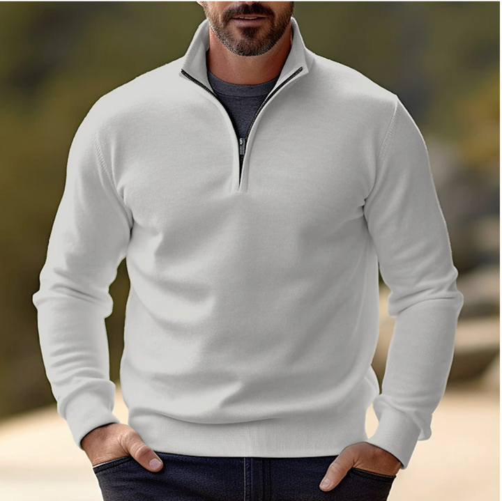 Men's quarter-zip pullover sweater featuring long sleeves, stand collar & ribbed cuffs for versatile style.