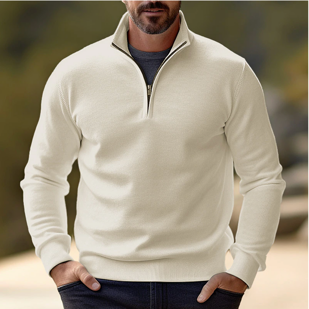 Modern men's long sleeve quarter-zip sweater for layering. Stylish casual wear with a comfortable pullover fit.