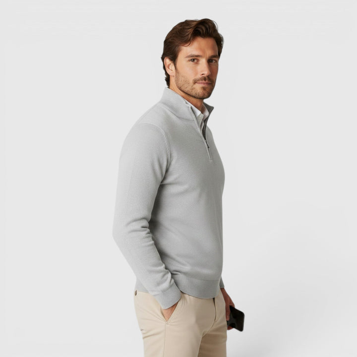 Men's quarter zip sweater in versatile color. Elevates any smart casual or office outfit.