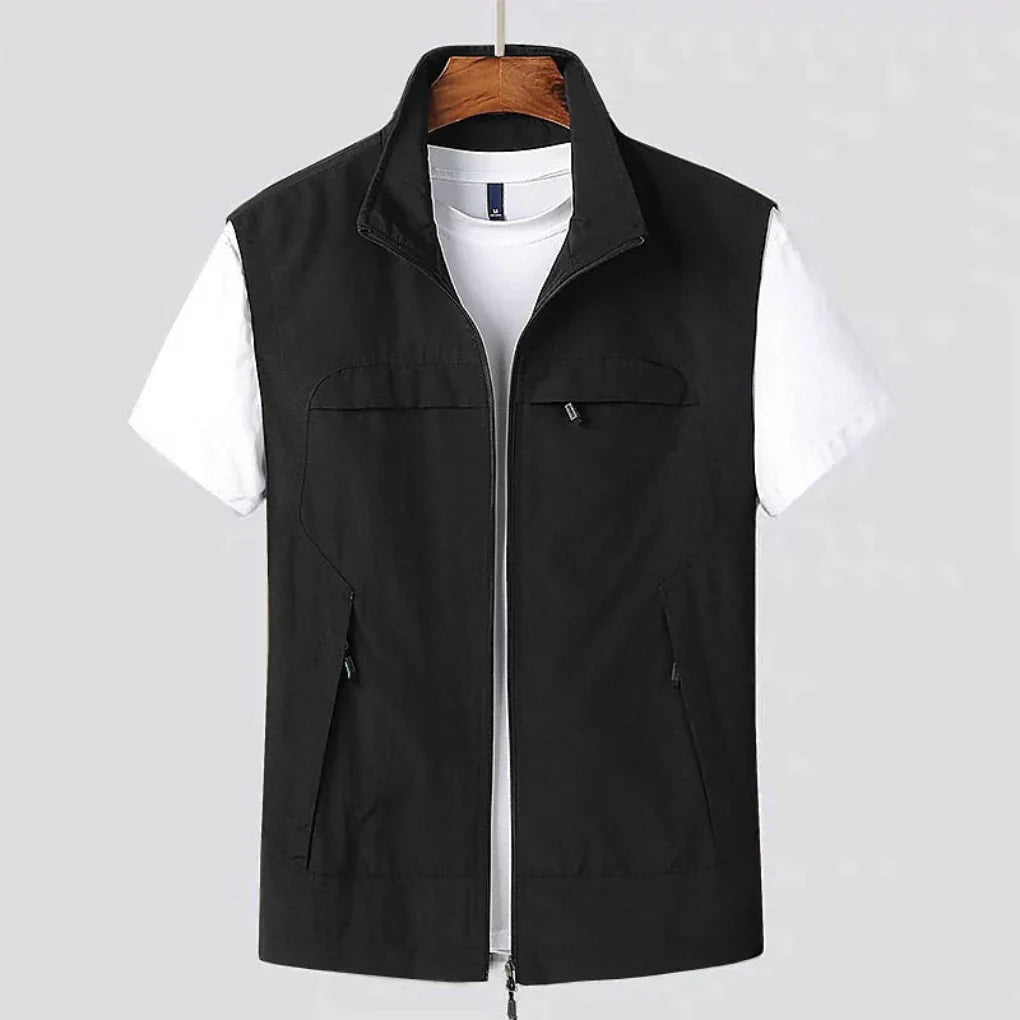 Breathable sleeveless utility vest for active men's outdoor gear.