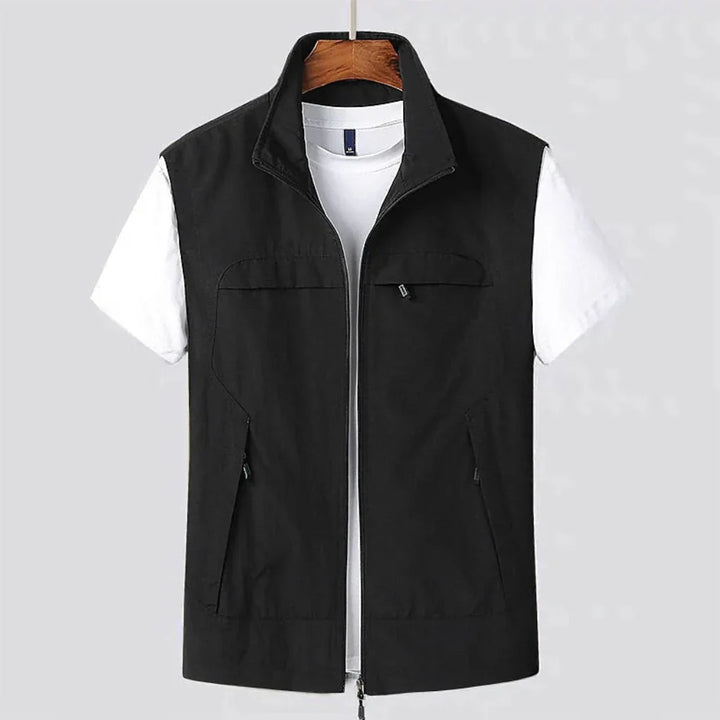 Breathable sleeveless utility vest for active men's outdoor gear.