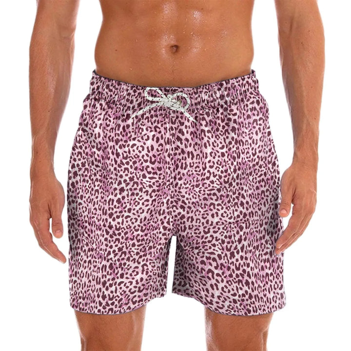 Stylish men's quick-dry paisley swim shorts, ideal for beach, pool, or casual summer fashion. Lightweight comfort.