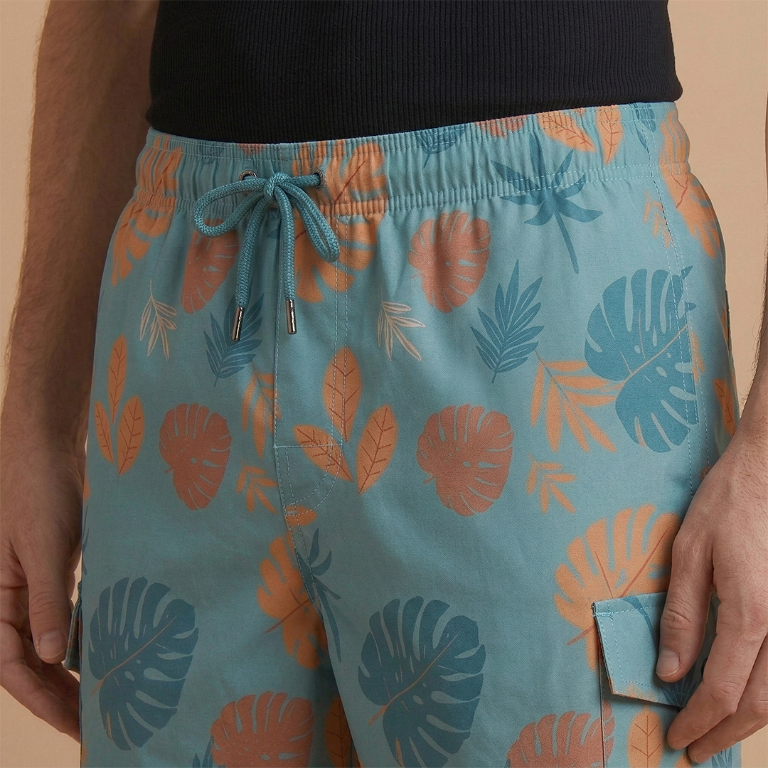 Men's mid-length quick-dry swim shorts, stretch waist for ultimate summer comfort & style.