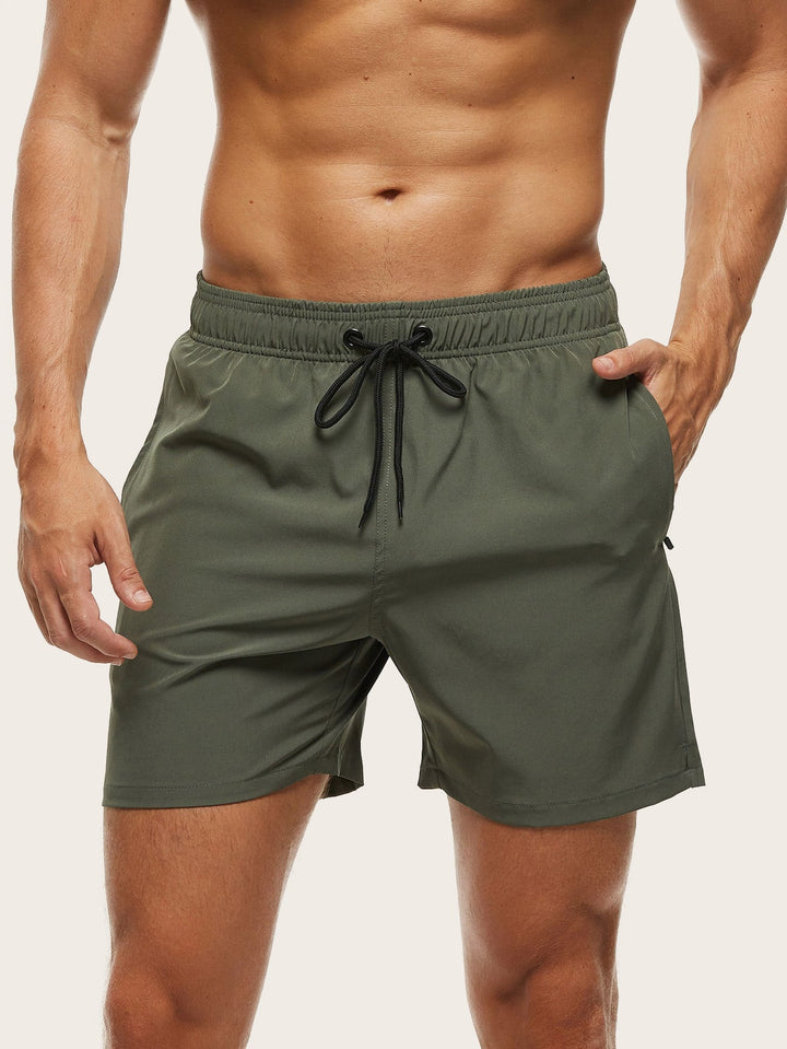 Versatile men's quick-dry stretch beachwear, perfect for swimming & relaxing by the water.