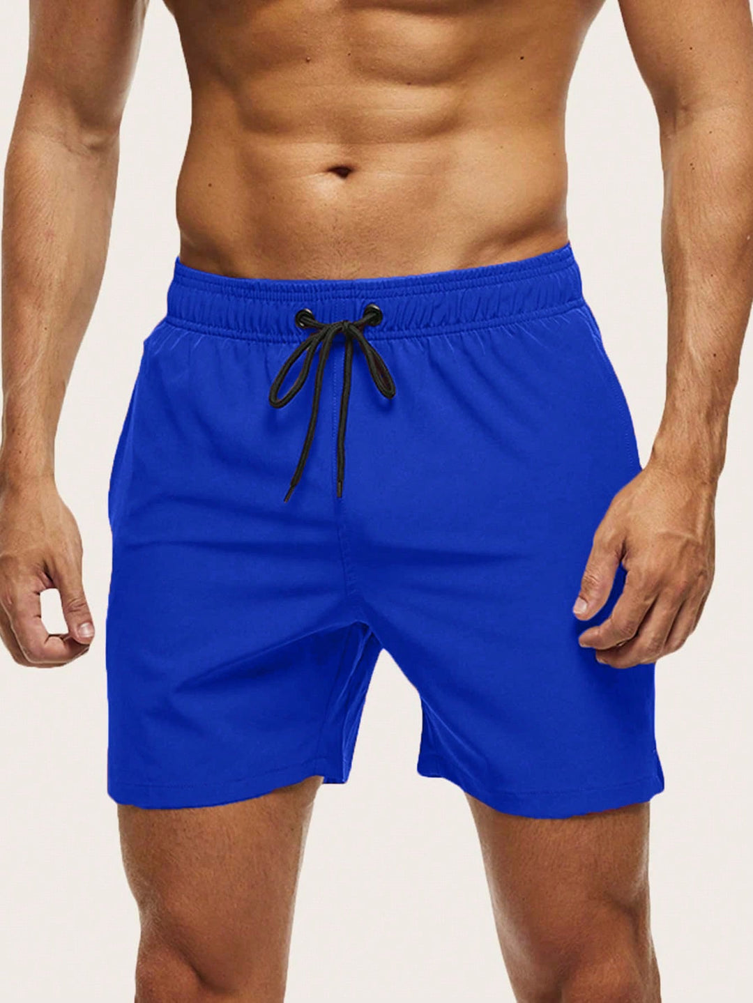 Black men's quick-dry stretch swim shorts for ultimate comfort & beach style. Perfect holiday wear.
