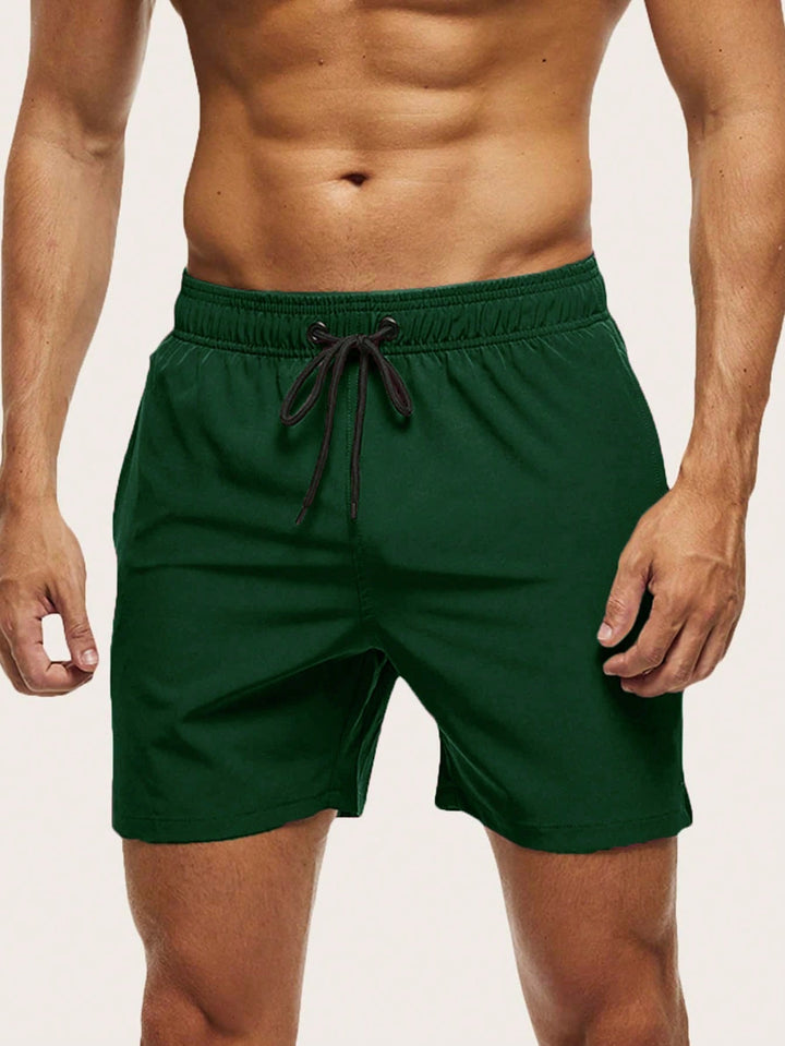 Vibrant men's quick-dry pool shorts, lightweight & stretchable. Ideal for summer fashion & activities.