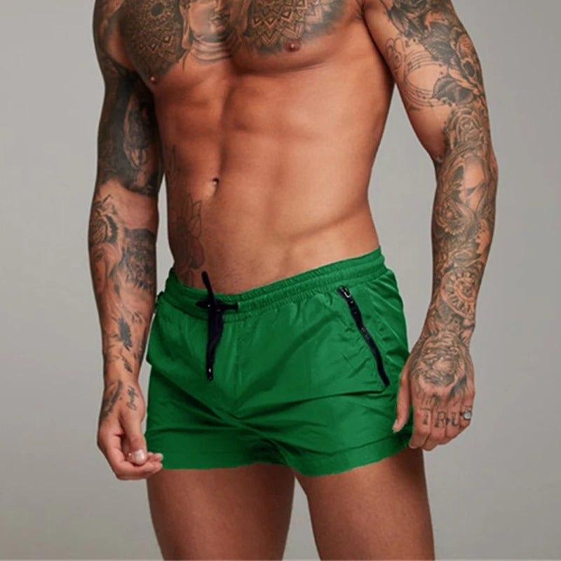 Comfortable men's stretch swim shorts, quick-dry fabric, with pockets for beach & pool.