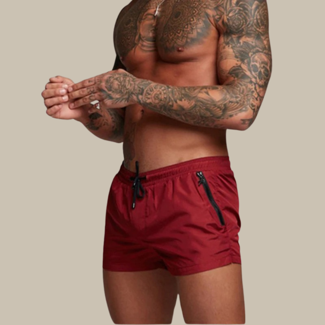 Stay active with men's quick-dry stretch swim shorts. Features pockets for beach, pool & summer fun.