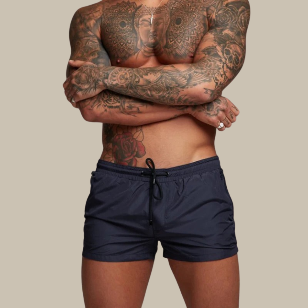 Athletic men's quick-dry stretch swim shorts with pockets, designed for swimming & active beachwear.