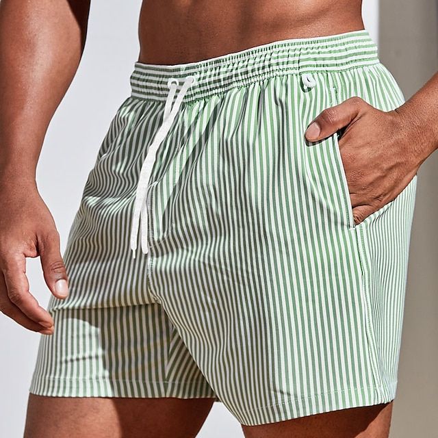Sporty men's quick-dry boardshorts, striped design for ultimate comfort & freedom of movement.