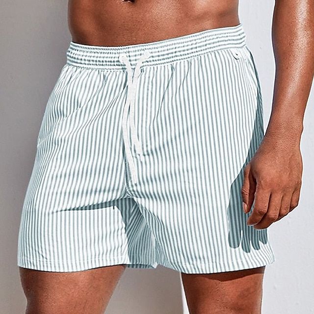 Multi-colored striped quick-dry boardshorts for men's beachwear. Essential summer pool shorts.