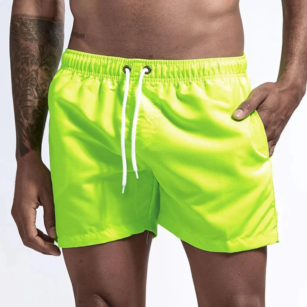 Sporty men's quick-dry swim shorts, excellent for beach sports and swimming.