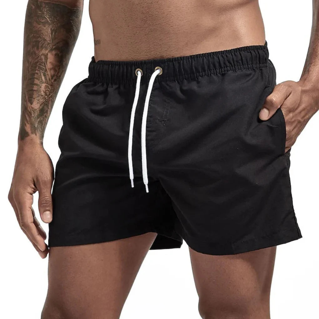 Quick-drying men's swimwear shorts, perfect for pool, beach & vacation.