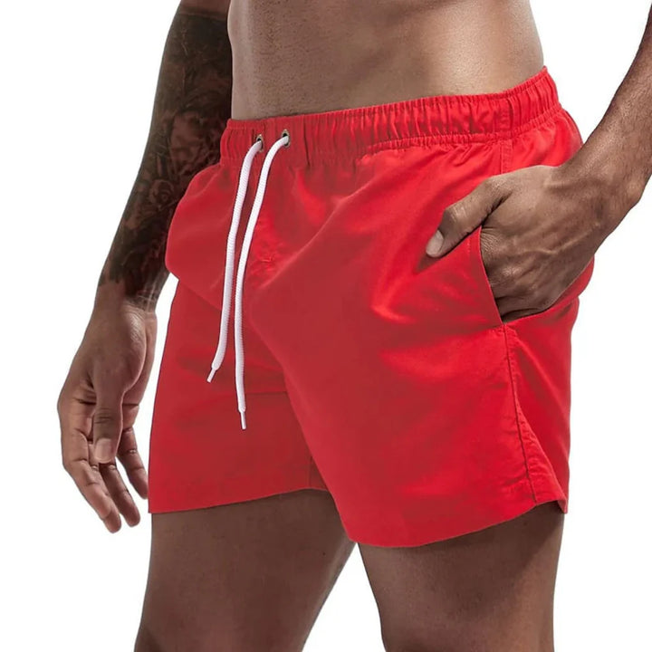 Active men's quick-dry swim shorts for beach sports and casual summer wear.