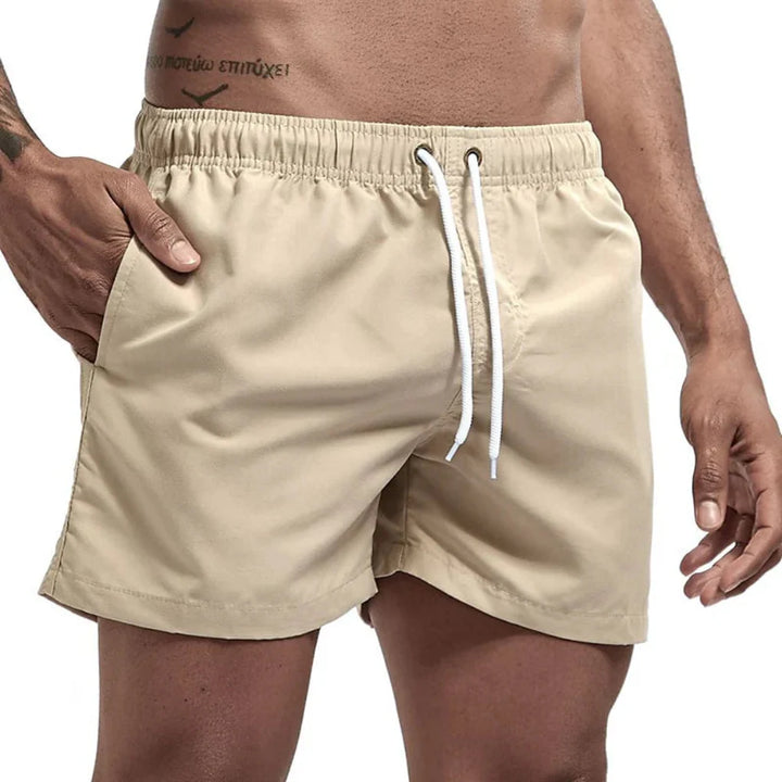 Stylish quick-drying men's beach shorts, ideal for pool, beach, and casual wear.