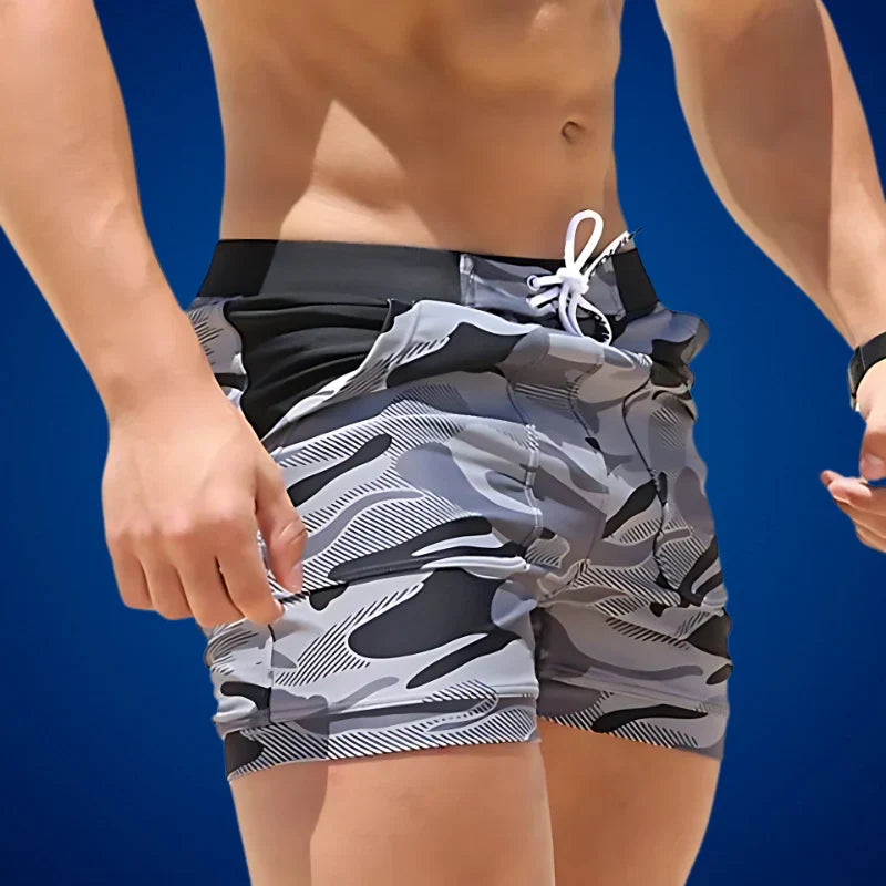Lightweight men's summer swim shorts, quick-drying fabric for beachwear, vacation, or casual poolside style.