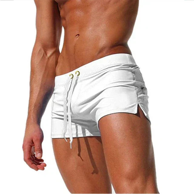 Men's quick-dry swim shorts with adjustable waistband for beach and pool activities.