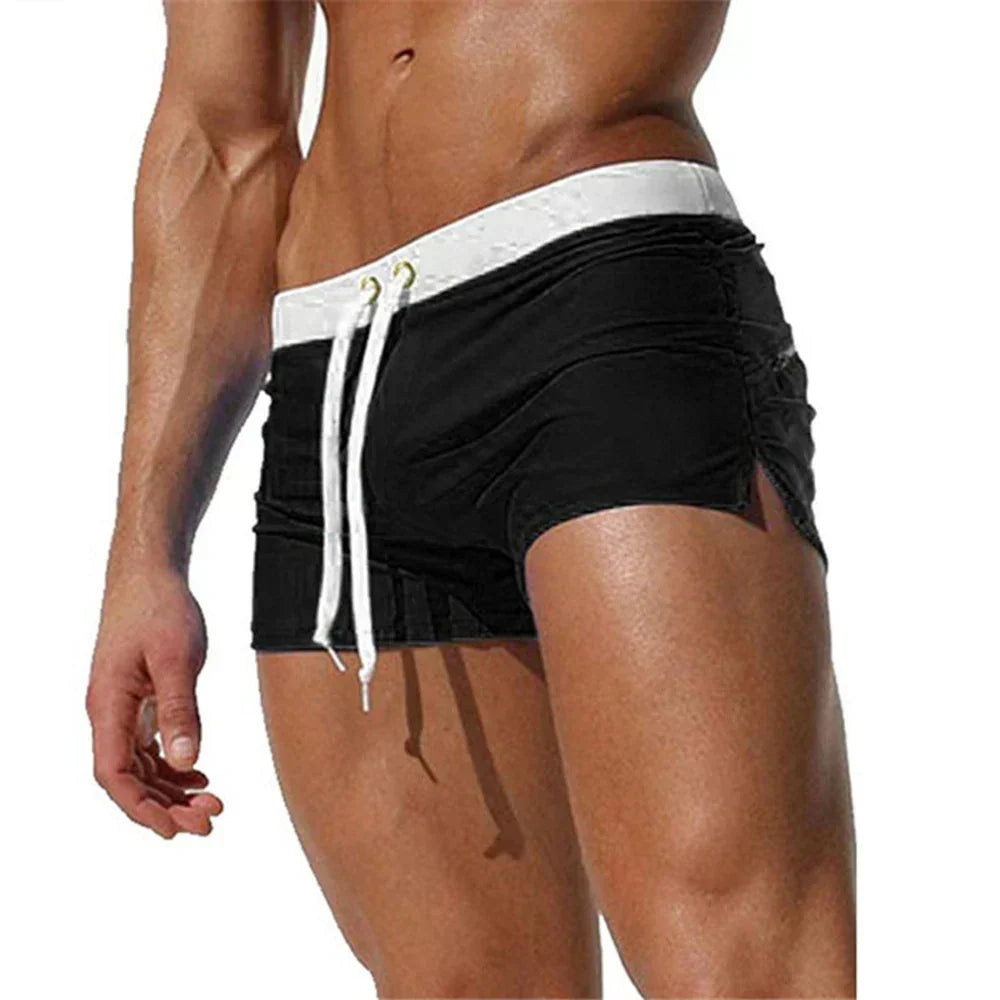 Comfortable men's athletic quick-dry swim shorts with adjustable waist for active water sports.
