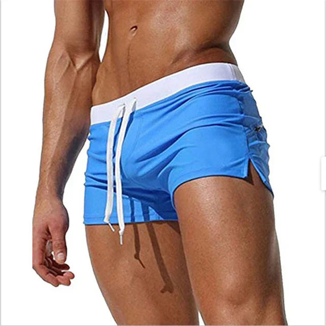 Men's quick-dry swimwear for vacation. Adjustable waistband ensures a perfect fit for travel.