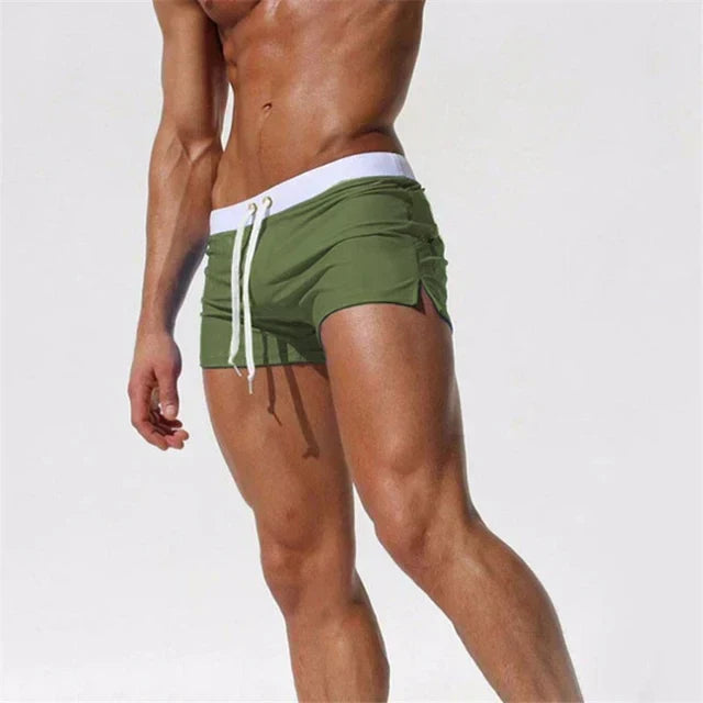 Fast-drying men's swim shorts with adjustable waist for optimal beach and pool performance.