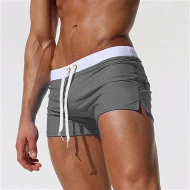 Versatile men's quick-dry shorts, ideal for swimming, beach, or casual summer wear.
