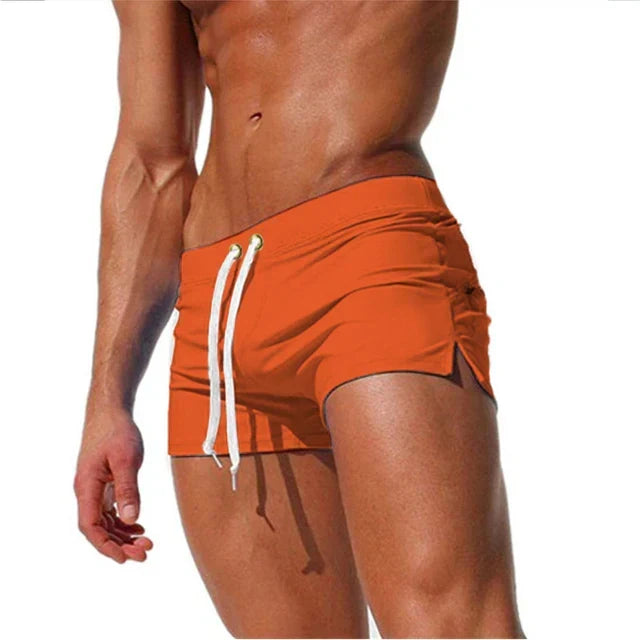 Lightweight, quick-dry men's swim shorts with adjustable waistband for ultimate comfort.