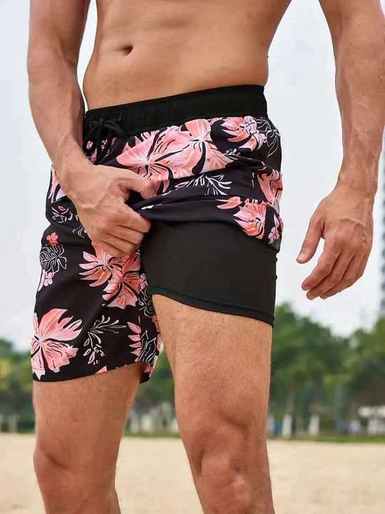 Stylish men's board shorts: quick-dry material, secure compression lining. Essential summer beachwear.