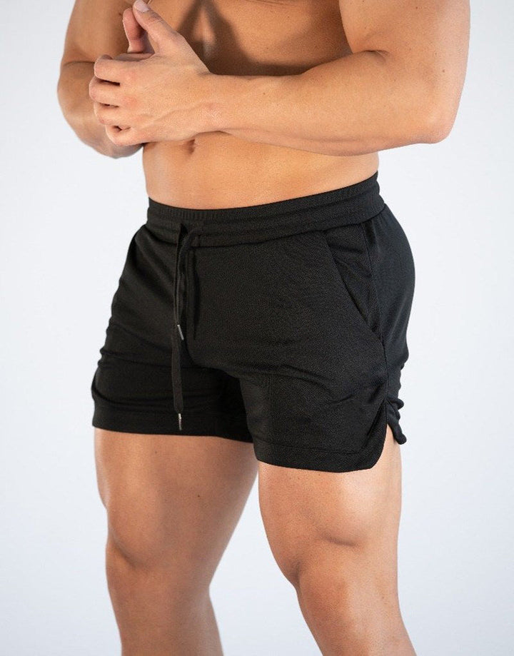 Men's quick-dry swim shorts with elastic waist, perfect for beach, pool, or casual summer wear. Essential vacation trunks.