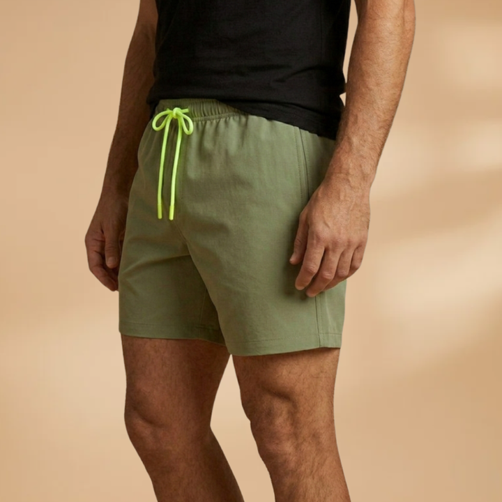 Comfortable men's quick-dry swim shorts, ideal for watersports & summer beach activities.